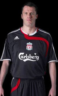Jamie Carragher with the new LFC European Away Shirt
